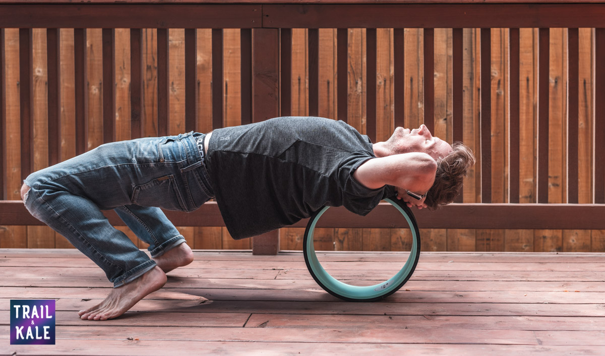 Try to get your bodyweight over the wheel by raising your hips up as you roll - you'll feel the effects so much better!