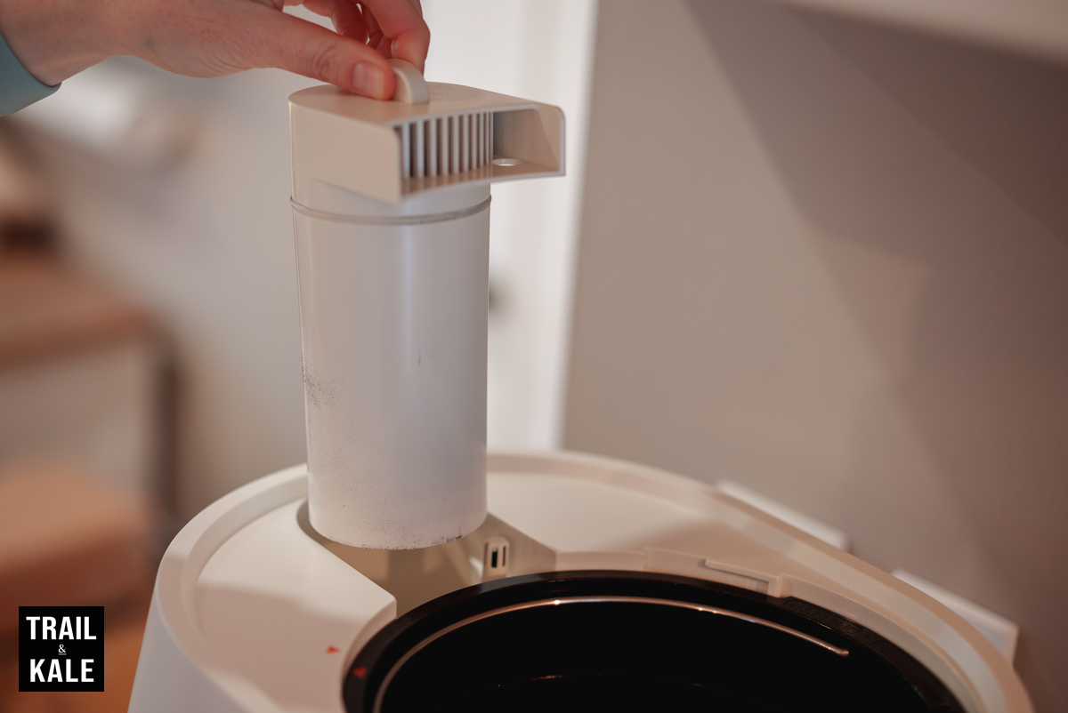 One of two charcoal filters to stop odors escaping from the Lomi