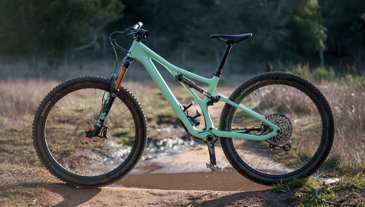 My trusty steed is a full-suspension Specialized Stumpjumper Pro with 29 inch wheels