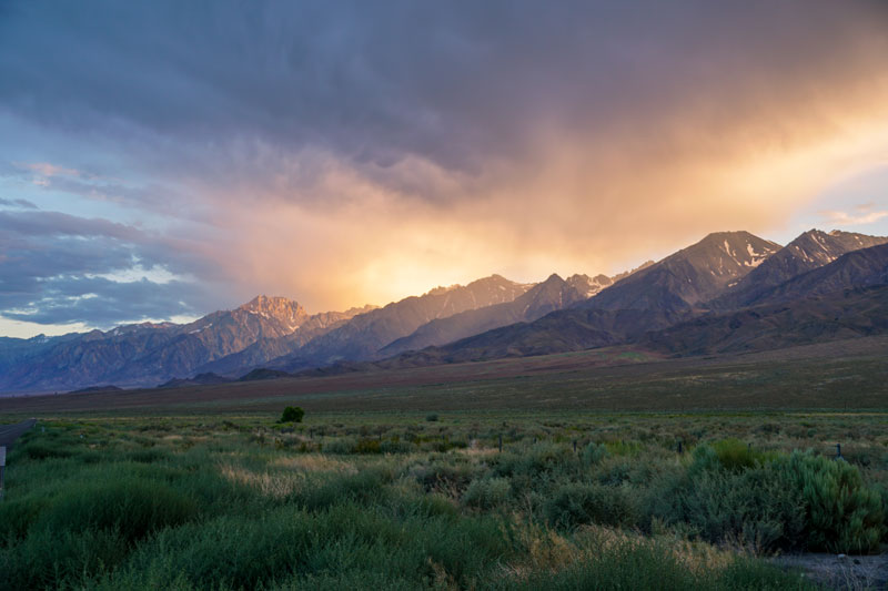 mountain range with clouded colorful sunset eastern sierra nevada mountains california desert road trip