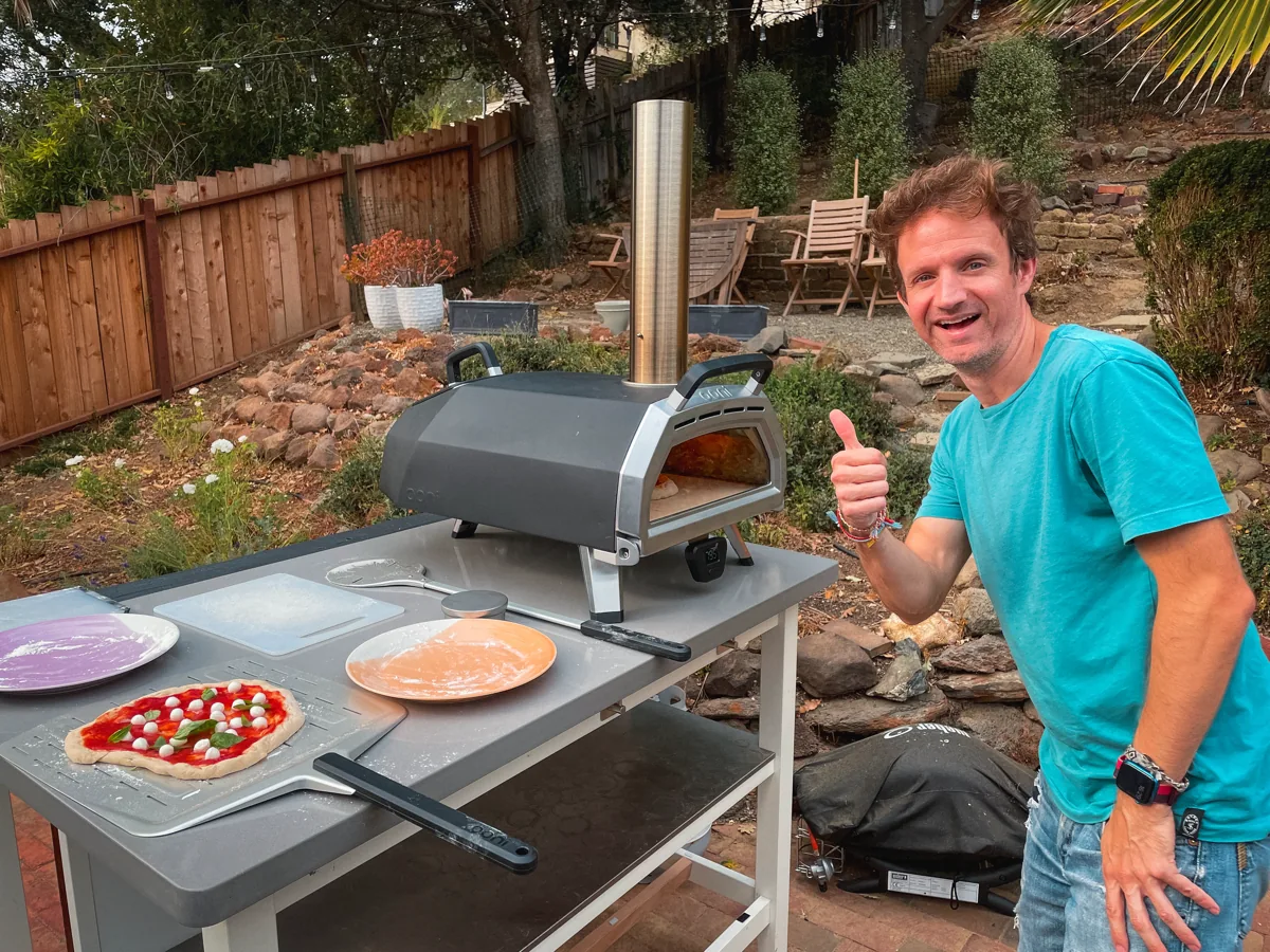 Yeah, ok – I get excited when I’m baking pizza in the backyard – it’s fun! Pizza peel to launch and collect your pizza is on the left, and the longer, more slender tool on the right is called a turner, to periodically turn your pizza as it cooks.