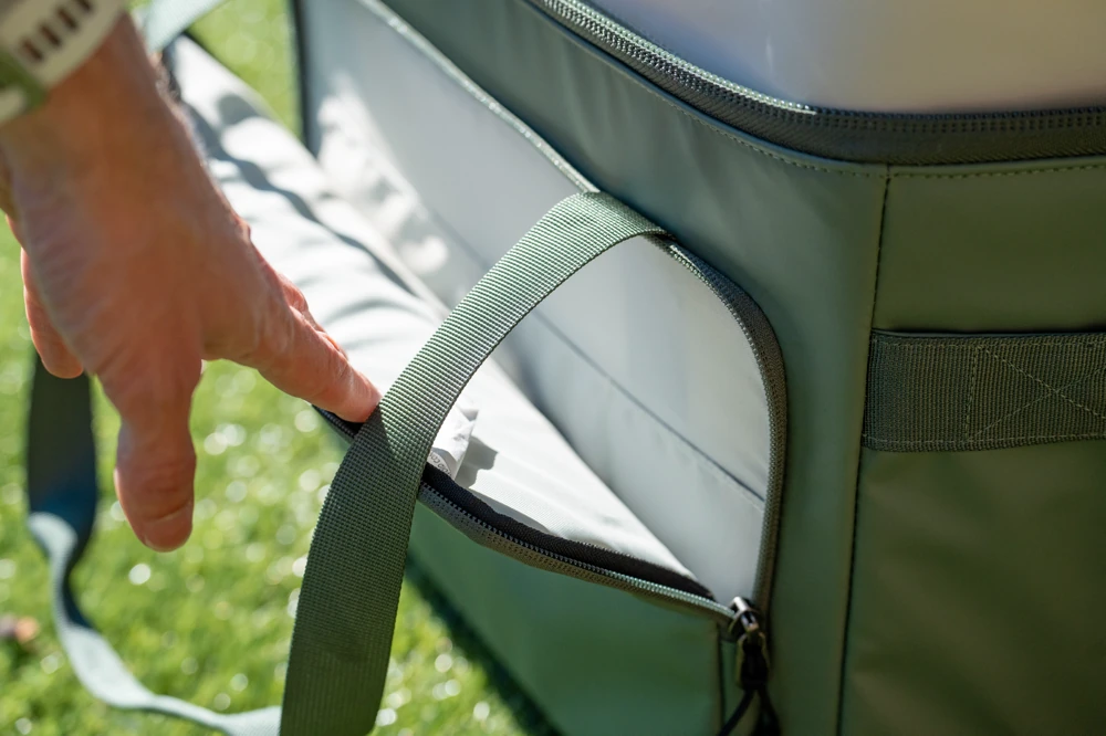 REI Co-op Trailgate 30L zippered storage pouch on the front