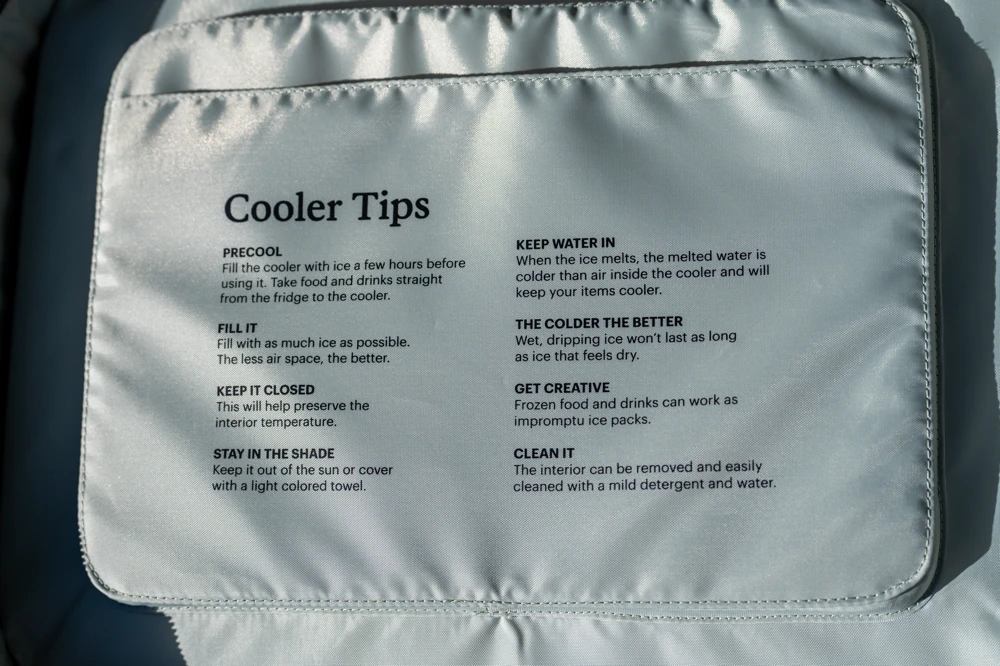 REI Co-op Trailgate 30L usage instructions are written on the inside