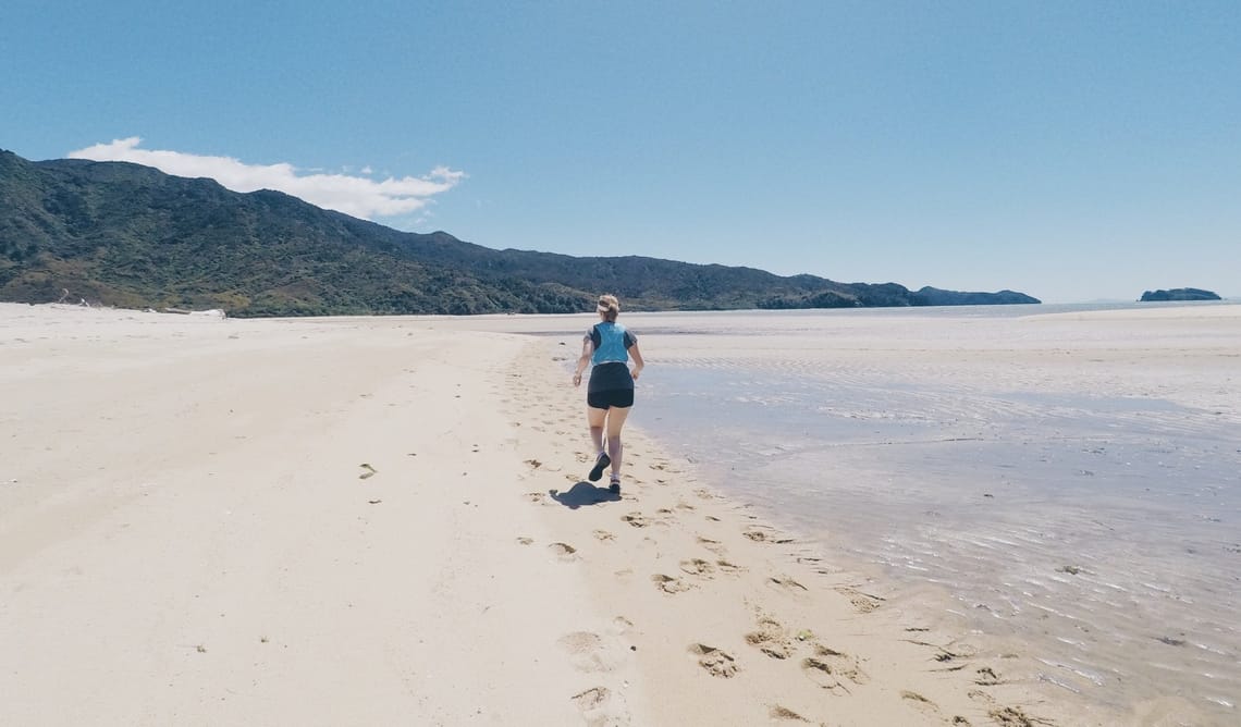 Trail running Abel Tasman National Park beach